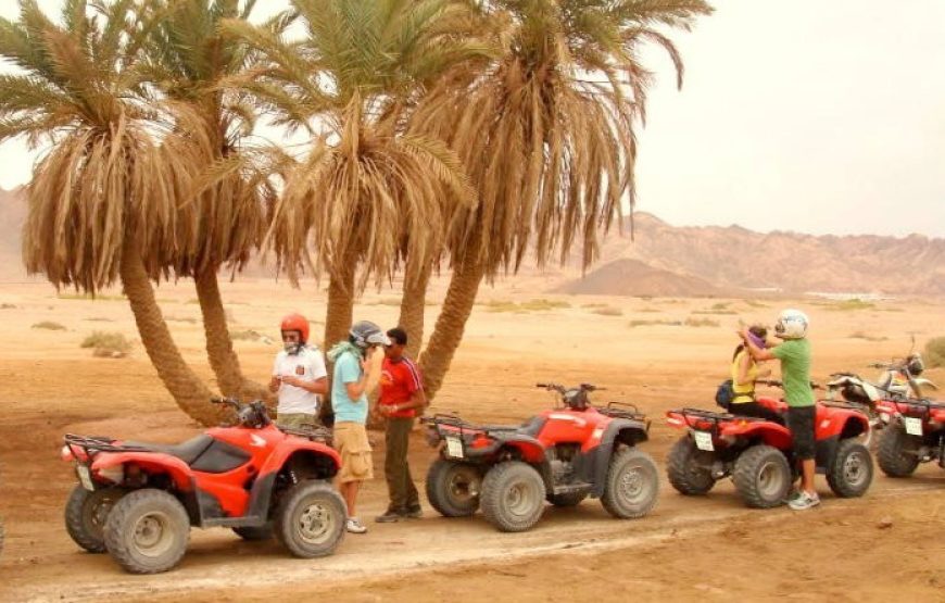 Safari Trip Hurghada desert by Quad Bike in with sunset.