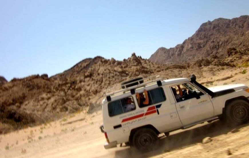 Safari Trip Hurghada desert by Quad Bike in with sunset.